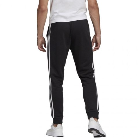 Spodnie adidas Essentials Tapered Cuff 3 Stripes M GK8831 Adidas