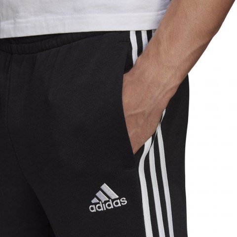 Spodnie adidas Essentials Tapered Cuff 3 Stripes M GK8831 Adidas