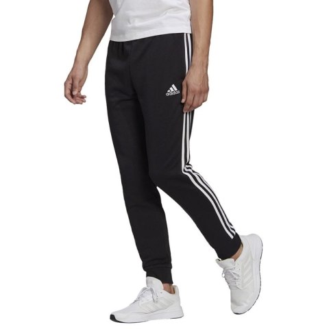 Spodnie adidas Essentials Tapered Cuff 3 Stripes M GK8831 Adidas