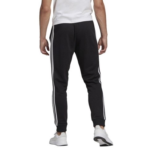 Spodnie adidas Essentials Tapered Cuff 3 Stripes M GK8831 Adidas