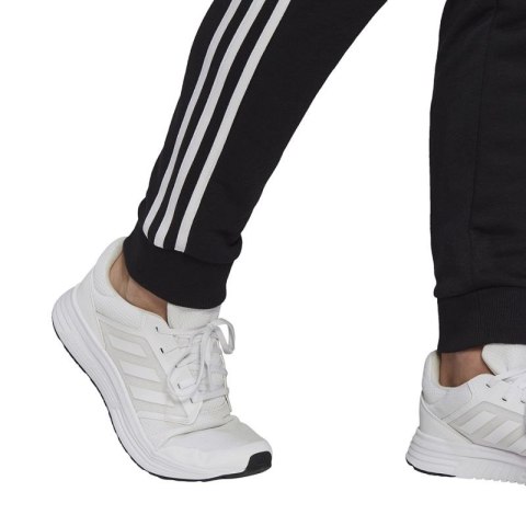 Spodnie adidas Essentials Tapered Cuff 3 Stripes M GK8831 Adidas